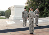 It may take months for a soldier to earn the right to TEST to wear the coveted Silver Tomb Guard Identification badge, and even then, the award is temporary. Only after the sentinel has served at the Tomb of the Unknown Soldier for nine months does the award become permanent. One of the Army's rarest emblems, it features the inverted laurel and a replica of the East face of the tomb where Greek images represent the virtues of Victory, Valor, and Peace.