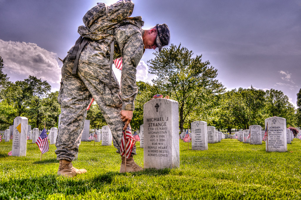 For more than 60 years, the 3rd U.S. Infantry Regiment (The Old Guard) has honored America's fallen heroes by placing American flags at grave sites for service members buried at both Arlington National Cemetery just prior to the Memorial Day weekend.