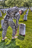 Within four hours, more than a thousand Old Guard Soldiers will place a small American flag one foot in front of and centered at more than 220,000 grave markers, to honor every individual buried at Arlington National Cemetery.  Old Guard Soldiers will also place an American flag at the foot of each Columbarium.