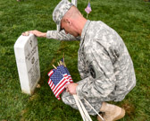 This tradition, known as "Flags in," has been conducted annually since The Old Guard was designated as the Army's official ceremonial unit in 1948. Every available soldier in the 3rd U.S. Infantry Regiment participates, placing small American flags at each headstone and at the bottom of each niche row.