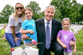Ryan Manion Borek, sister of Travis Manion with her daughters and Secretary of Defense Chuck Hagel
