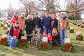 The Worcester family pose for photographs after laying a wreath at the grave site of Army Pvt. William Christman who died in service to his country, a victim of measles, the 20-year-old from Pocono Lake, Pa., died in a D.C. hospital in 1864.<br />He was the first person to be buried at Arlington National Cemetery, Christman has one of the most distinct honors in military history.<br />Arlington National Cemetery serves as the final resting place for military members, a tradition that began with Christman's burial in what is now Section 27.