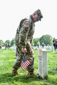 General Mark A. Milley places flag at the grave of 1st Lt. Kenneth M. Ballard.