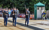 "Walking the Mat" refers to the Tomb Guard ceremonially guarding the Unknowns by walking back and forth on a rubber mat while maintaining 21 second interval