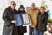 The Delaware General Assembly presents a tribute certificate to Wreaths Across America
