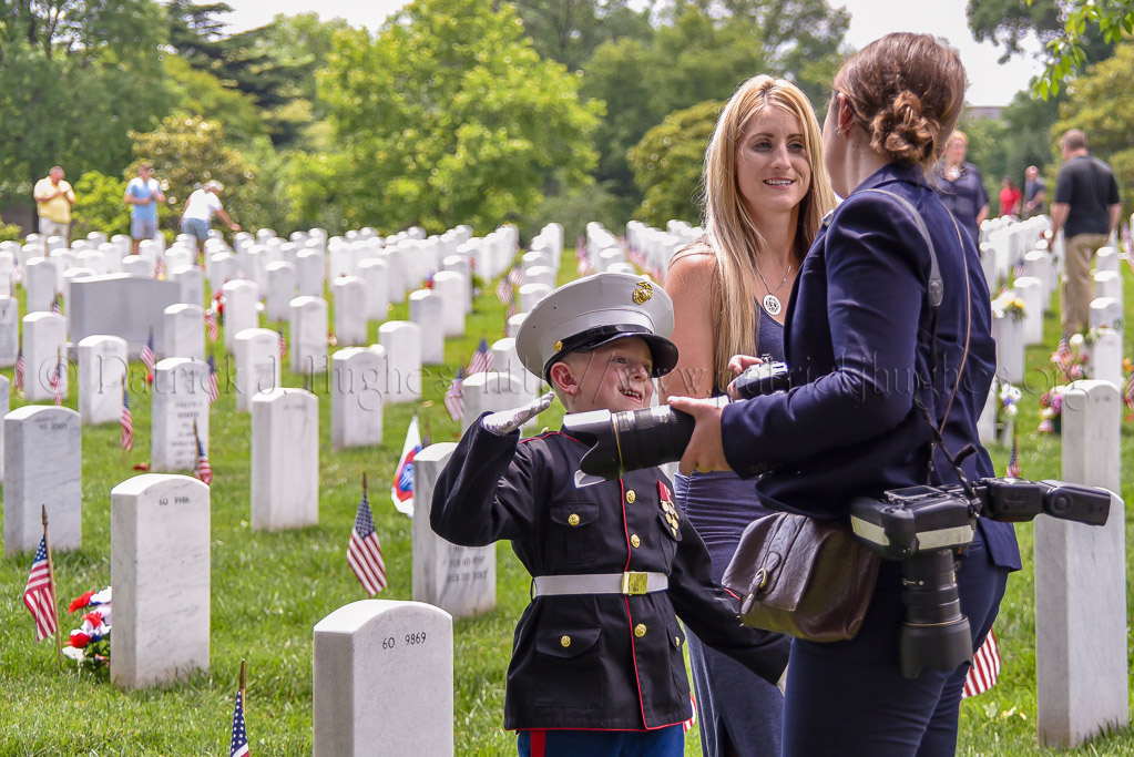 Chief Official White House Photographer Shealah Craighead speaks with Brittany Jacobs and her son Christian before President Donald J. Trump arrives to visit with the families of the fallen in Section 60.