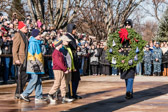 MOH Col. Roger Donlon who was the first Medal of Honor recipient in the Vietnam War, as well as first green beret (special forces) recipient along with some children place a Wreath at the Tomb of the Unknowns.