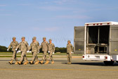 A solemn dignified transfer of remains is conducted upon arrival at Dover Air Force Base, DE.