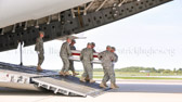Army carry team carries the transfer case containing the remains of Sgt. Devin J. Daniels of Kuna, ID upon arrival at Dover Air Force Base, DE on August 29, 2011. The Department of Defense announced the death of Daniels who was supporting Operation Enduring Freedom – Afghanistan.