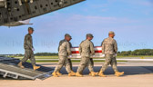 Army carry team carries the transfer case containing the remains of Pfc. Jesse W. Dietrich of Venus, TX upon arrival at Dover Air Force Base, DE on August 29, 2011. The Department of Defense announced the death of Dietrich who was supporting Operation Enduring Freedom – Afghanistan.