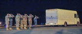 Final Steps Mortuary vehicle driver starts engine, and Security Forces vehicle moves into escort position in front Transfer vehicle begins to pull away Dignified transfer officer orders final “Present, Arms” and “Order, Arms” (slow salute) as vehicle departs Carry team follows (by walking) transfer vehicle, with the transfer vehicle guide walking behind the carry team