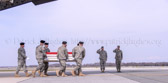 Air Force Col. John Devillier, Air Force Mortuary Affairs Operations, and Major Gen. John G. Rossi, Director, Army Quadrennial Defense Review Office of the Deputy Chief of Staff, salute at Dover Air Force Base, DE