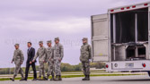 A dignified transfer is the process by which, upon the return from the theater of operations to the United States, the remains of fallen military members are transferred from the aircraft to a waiting vehicle and then to the port mortuary. The dignified transfer is not a ceremony; rather, it is a solemn movement of the transfer case by a carry team of military personnel from the fallen member's respective service. A dignified transfer is conducted for every U.S. military member who dies in the theater of operation while in the service of their country. A senior ranking officer of the fallen member's service presides over each dignified transfer.