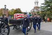 Six of the horses pull a flag draped casket on a black artillery caisson. Both Soldiers and horses are conscious that this is no ordinary ride through a cool, shady country lane. They have the honor of carrying a comrade for his last ride to Arlington National Cemetery, where he will rest in peace with other honored dead.