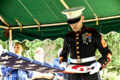 Marine Gunnery Sergeant Nathan McGinnis and Captain Jeremiah Culp folded the flag of our country.