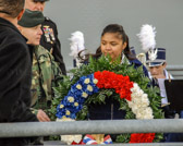 Colonel John Rawley assists student with Memorial Wreath Ceremony