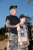 Chuck 'Graves' Roth attends ceremonies with his grandson CJ Faustino. 109 children lost their fathers that black Sunday