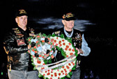 Rolling Thunder® National members Jay Fairlamb and Bob “Boots” Berg  place a wreath at the Memorial