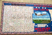 Peace quilt with the pictures of all who died at each site