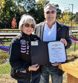 Rosely Robinson of A Hero’s Welcome of Delaware presents a certificate of appreciate to Bill Gafford, the president of the Vietnam Veterans of America Chapter 67 for your service and sacriface and dedication to the preservation of our freedom.  We are pleased to recognize you as an American Hero.