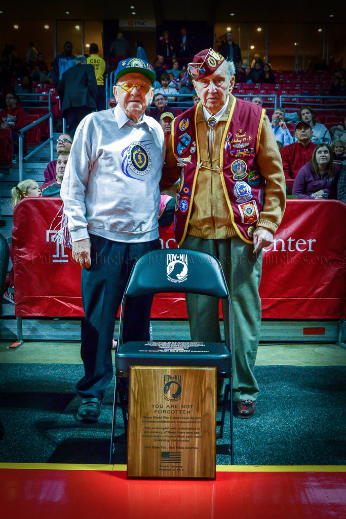 Former World War II Prisoners of War Ted Paluch ( a Melmedy Massacre Survivor) and Bill Clarke ( Stalag 17 ) helped with unveiling of Temple's “One Empty Seat” the POW-MIA National Chair of Honor.
