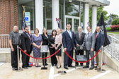 Members of Merck Sharp & Dohme FCU along with their Veterans Group help to dedicate their second POW/MIA National Chair of Honor at their Collegeville Branch.