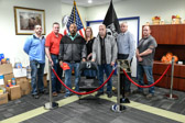 Members of Merck Sharp & Dohme FCU along with Merck's Veterans Employee Business Resources Group including Dawn Fitzgerald helped to dedicate their third POW/MIA National Chair of Honor at their Merch West Point, PA  Branch.