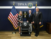 On June 14, 2021, Flag Day a POW/MIA National Chair Of Honor was unveiled in the renovated lobby of the Defense POW/MIA Accounting Agency Headquarters. <br /><br />Colleen Shine, the daughter of Lt. Col. Anthony C. Shine, USAF (Missing in Action from 1972-1996), Ralph W. Galati (former Vietnam POW) and Kelly McKeague (Director, Defense POW/MIA Accounting Agency).