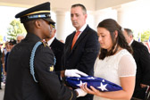 The folded flag of Our Country was presented to Justine Newman.  "This flag is presented on behalf of a grateful nation and the United States Army as a token of appreciation for your loved one's honorable and faithful service."