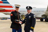 Marine Escort L/Cpl Calvin LeClear with Family member Great Nephew, Officer Anthony “Tony” Faverio, Jr. of the Metropolitan Police in Washington, DC.