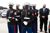 Marine Body Bearers stand at the ready for this dignified transfer of PFC Raymond Warren