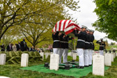 “The Last to Let You Down.”  They are the Body Bearers, an elite unit that carries Marines to their final resting place.<br />The Marines have a long-standing tradition of carrying the casket at shoulder height, which symbolizes the respect and honor given to the fallen. This practice reflects the Marine Corps' emphasis on discipline, precision, and ceremonial excellence.