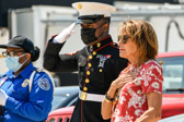 On the tarmac to welcome home her uncle is his niece Janet A. Cook.  Janet’s mother was the sister of First Lieutenant Mills.  Joining Janet are members of our Airport Family.