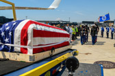 Marine Body Bearers move towards the casket