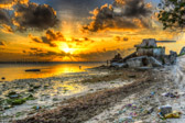 Tarawa, coral atoll of the Gilbert Islands and capital of Kiribati, in the west-central Pacific Ocean. It lies 2,800 miles (4,500 km) northeast of Australia and is the most populous atoll in the Gilberts. Tarawa consists of a lagoon fringed by a V-shaped reef 22 miles (35 km) long and made up of more than 30 islets.