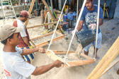 A number of the locals were hired to help in the digging and sifting of soil for remains.