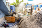 Because the water table on Tarawa is only 2 ½ to five feet below the ground's surface an artesian well was set up to pump the water out away from where we were digging under the building.