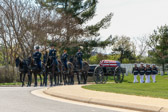 Marine Body Bearers follow behind the Fort Myer Army caisson team