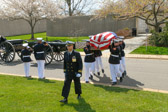 Remains of Pvt. William E. Rambo are removed from the caisson and carried by Marine Barracks Washington DC Body Bearers to Section 62 burial site lead by Navy Chaplain.