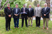 Bill Pollard holing flag along with Gold Star Fathers who helped with the folding of 'Our Flag”.