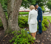 Pattie Elliott National President American Gold Star Mothers, Inc. along with Charles Q. Brown, Jr. the 21st Chairman of the Joint Chiefs of Staff placed a bouquet of Eleven White Roses at the “Mother’s Tree”.