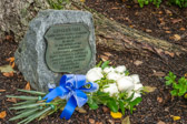 A bouquet of Eleven White Roses was placed at the “Mother’s Tree”.