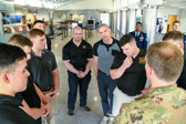 Marine Body Bearers go over plans prior to C-130 arrival with Hershel “Woody” Williams remains